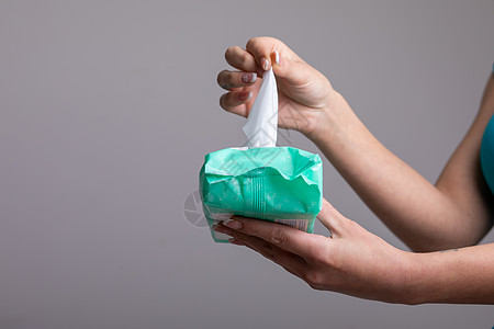 将婴儿湿擦除于包装物中     卫生程序和纸巾消毒组织打扫清洁工湿巾成人女性卫生图片