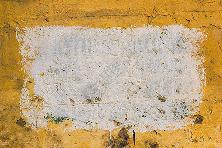 具有模具背景的黄色墙壁风化裂缝古董墙纸房子材料框架石膏水泥建筑图片