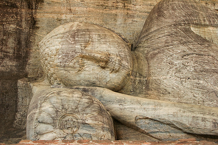 斯里兰卡古老的废墟 佛像向后仰立增值税旅行雕塑佛教徒雕像历史文化宗教遗产冥想图片