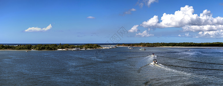 乘船从新河经埃斯特罗湾向海洋和L方向航行海景旅行海岸沿海热带假期运动海岸线海滩蓝天图片