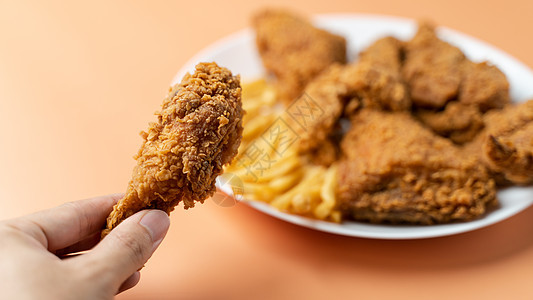 手握鼓棍 薯条煎鸡肉炸鸡盘子营养垃圾美食午餐胸部食物面包屑翅膀鸡腿图片