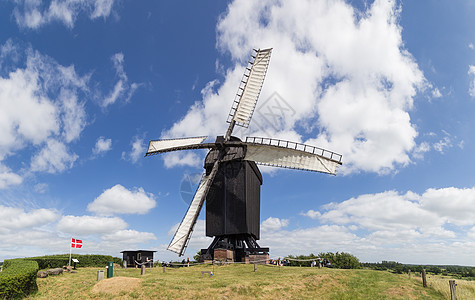 历史悠久的丹麦风车建筑学观光农场农村力量爬坡旅行管道木头天空图片