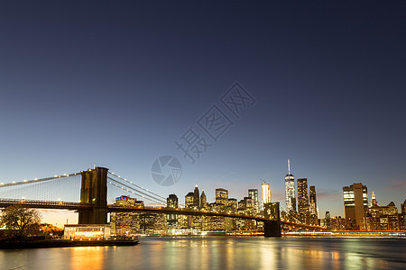 纽约与布鲁克林桥的天线景观摩天大楼旅游地标风景建筑市中心建筑学都市日落图片