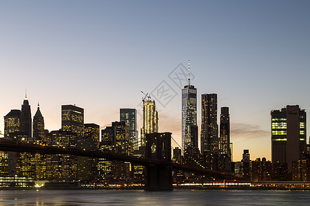 纽约与布鲁克林桥的天线天际城市旅行日落观光摩天大楼景观地标市中心建筑学图片