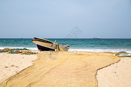 在斯里兰卡Trincomalee海滩的渔船旅游旅行蓝色热带海景天空情调齿轮海岸海洋图片