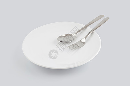 在白色背景上隔离的菜勺和叉子 食品用具 空陶瓷盘 厨房用具或工作室不锈钢餐具 对象概念反射服务银器陶器金属餐厅厨具勺子午餐用餐图片