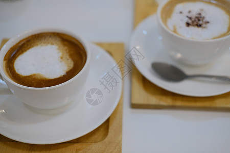 热辣卡布奇诺莫查咖啡拿铁 饮料拿铁咖啡店奶油食物杯子咖啡桌子牛奶图片