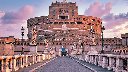 罗马雕塑圣天使城堡在意大利罗马罗马的Castel SantAngelo 在日出时无人居住的历史纪念碑古物古董城市建筑寺庙大理石风格文化首背景