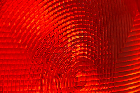 红色多面塑料的抽象背景活力尾灯反光板警告玻璃大灯信号弹射图片