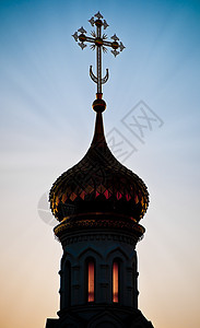 俄罗斯教堂圆顶的光环宗教钟楼尖顶地标上帝蓝色日落文化旅游教会图片