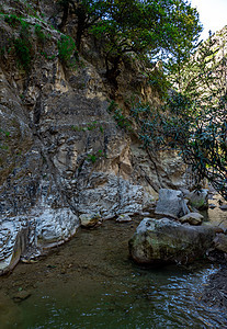 塞浦路斯岛屿的吸引性物石头人行道地质学溪流冒险旅行小路岩石公园阳光图片