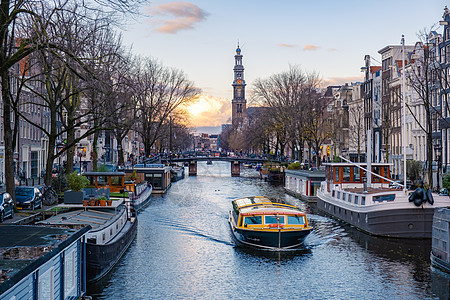 日落时荷兰阿姆斯特丹 日落时古老运河建筑房子街道城市照明窗户景观旅行建筑学历史图片