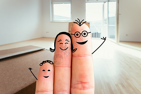 家庭进入一个新的家庭概念 在模糊明亮的房间前画指的手指家庭卡通片教育乐趣旅行幸福母亲房子搬家箱旅游喜悦图片