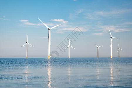 海上风车公园 有暴云和蓝天 海中风车公园植物农场生态涡轮机力量环境涡轮天空活力发电机背景图片