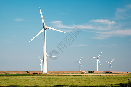 海上风车公园 有暴云和蓝天 海中风车公园力量场地农场涡轮蓝色技术植物生态活力涡轮机背景图片