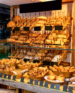 法国面包 糖果店 展示品女士陈列柜面粉生意面包师服务职业店铺糕点女性图片