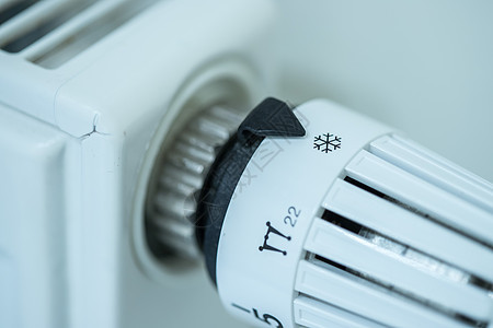 热器上暖气调节器 闭合画面 加热成本季节灯丝节能装置建设取暖费气体电气恒温器温度图片