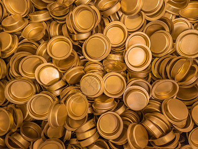 一堆冲压薄板黄铜帽形半成品加工仓库冲孔青铜制造业生产床单画幅合金墙纸图片