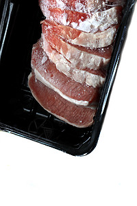 冰冻的肉片杂货店鱼片猪肉托盘市场饮食烧烤摊位食物牛扒图片