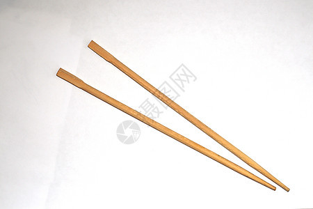 白色背景的木制筷子物品用具用餐食物文化竹子工具餐厅木头木质图片