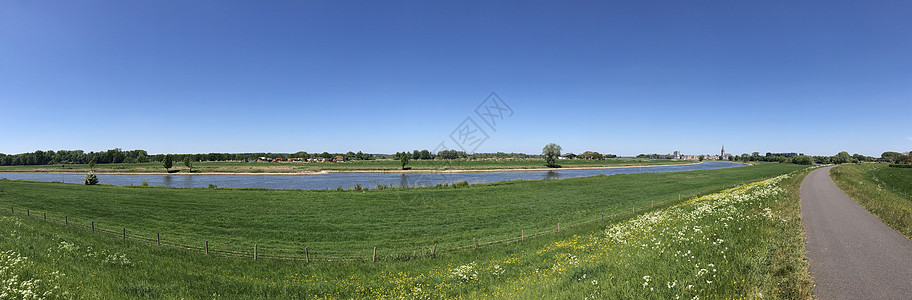从IJssel河到Dosburg的全景教会城市小路休闲堤防蓝天图片