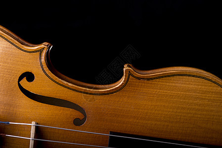 Violin 黑色隔离的闭合音乐乐器音乐会细绳古董木头大提琴手大提琴黑暗中提琴艺术音乐家图片
