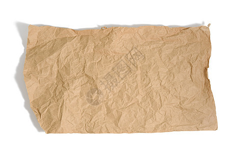 白色背景上带有撕裂边缘的棕色羊皮纸材料手稿剪贴簿损害皱纹床单褐色折痕包装纸回收图片