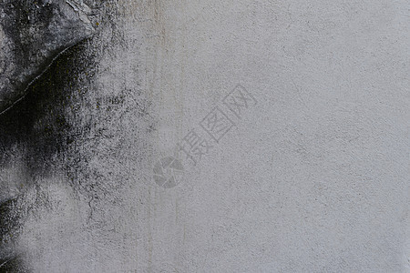 表面有划痕和斑点的灰色混凝土墙的垃圾纹理图片