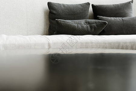 沙发上的坐垫灰色亚麻棉布织物衣服纺织品客厅家具摄影家居图片