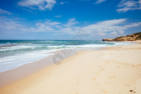 澳大利亚索伦托科奥尼亚海滩海岸海浪海洋天堂旅游岩景岩石阳光蓝色黄色背景图片