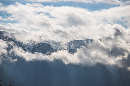 奥地利 雪山 云 雪和蓝天空的奥地堡天空明信片绝壁荒野探索天气悬崖冒险登山爬坡图片