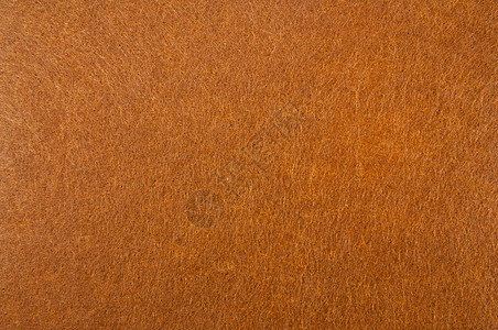 深棕色或橙色天鹅绒或法兰绒 Fabri 的纹理背景背景图片