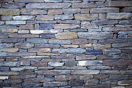 抽象岩壁墙纸材料石匠石板建筑学花岗岩棕色灰色石头石墙图片