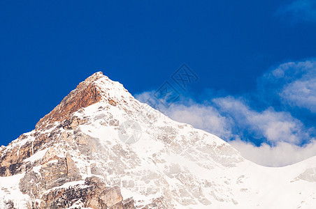 印度锡金山蓝天雪山高山冰川顶峰远景天空干城首脑环境日落旅行图片