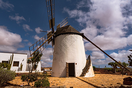 西班牙岛的风车历史风景火山蓝色历史性建筑学地标日落农业房子图片