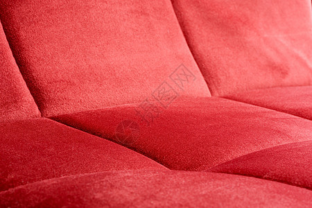 红色天鹅绒内饰织物的特写纺织品编织装饰钻石衣服床头板手工别针奢华纽扣图片