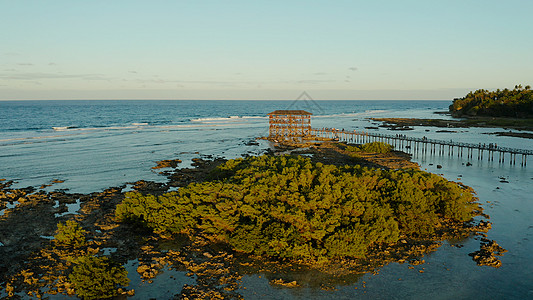 Siargao岛的浮点叫做9号云热带海岸海景理念海浪鸟瞰图行动日落冲浪板旅游图片