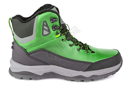 白色背景隔离的绿色绝绿冬季温暖 三季度运动鞋或靴子(白色背景)图片