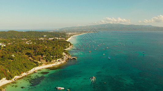 白沙沙滩的博拉凯岛 菲律宾海岸线太阳景观岛屿海洋旅行蓝色支撑海滩酒店图片