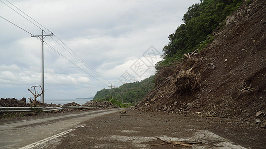 山路上的滑坡 菲律宾卡米吉岛灾难国家小路碎片路线危险土地封锁石头岩石图片