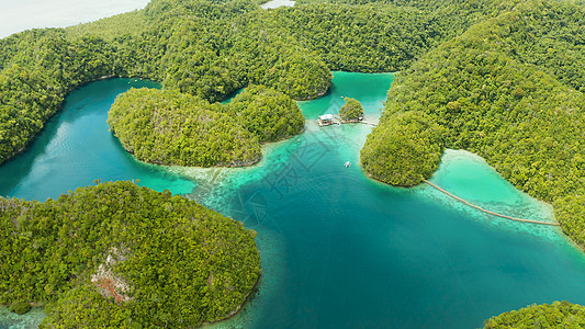 菲律宾Siargao的苏格巴环礁湖空中观察爬坡支撑热带海滩悬崖海景理念蓝色植物旅行图片