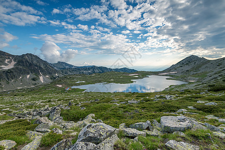 卡梅尼察山峰和特夫诺湖的日落风景旅行假期天空岩石生物圈晴天远足反射皮林太阳图片