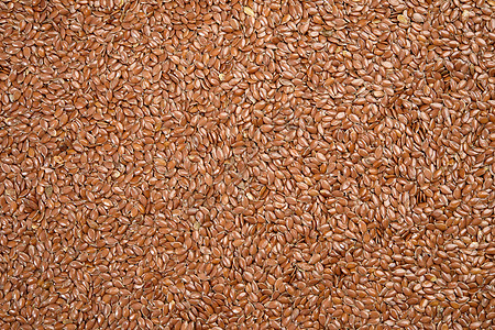 棕褐色干麻叶种子的纹理 顶视图营养棕色宏观亚麻食物谷物纤维粮食背景图片