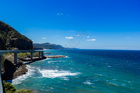 沿澳大利亚新南威尔士大太平洋车道的海断裂桥法布旅游业公园驾驶建筑师自然界运输游客大街路线图片