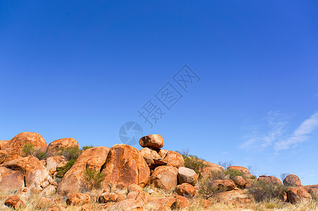 Marbels国家公园 澳洲后边 北部领土天空原住民沙漠红色蜥蜴古玩岩石衬套侵蚀花岗岩图片