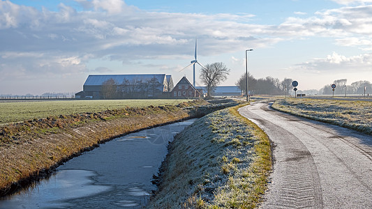 荷兰农村冬季耕地 有风车和农庄的温特开往荷兰农村地区图片
