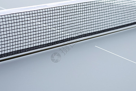 灰色背景的网球乒乓球净额工具俱乐部乒乓锻炼爱好训练游戏竞赛橡皮闲暇图片