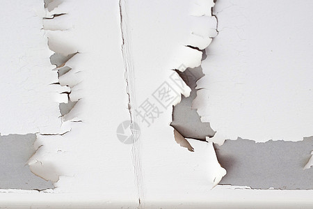 房子天花板上的白色油漆剥落 屋下风化地面维修建筑剥皮水分损害地震草图划痕图片