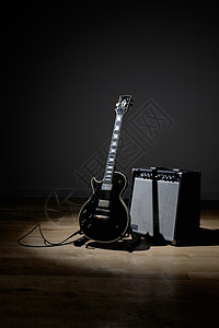 电吉他和扩音器吉他岩石工作室插头娱乐烦恼乐器音乐黑色金属图片