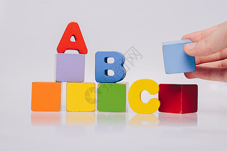 手玩多彩字母字母和建筑布条的游戏语言童年学习闲暇玩具教学幼儿园教育智力正方形图片